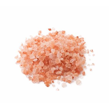 Medium Pink Himalayan rock salt granules in bulk displayed on a white background, highlighting natural crystal texture and mineral-rich appearance.